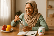 Pakistani woman preparing halal collagen powder supplement for consistent skin, hair, and joint health benefits
