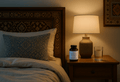 Magnesium glycinate tablets and water on a Pakistani bedside table for restful sleep and wellness.
